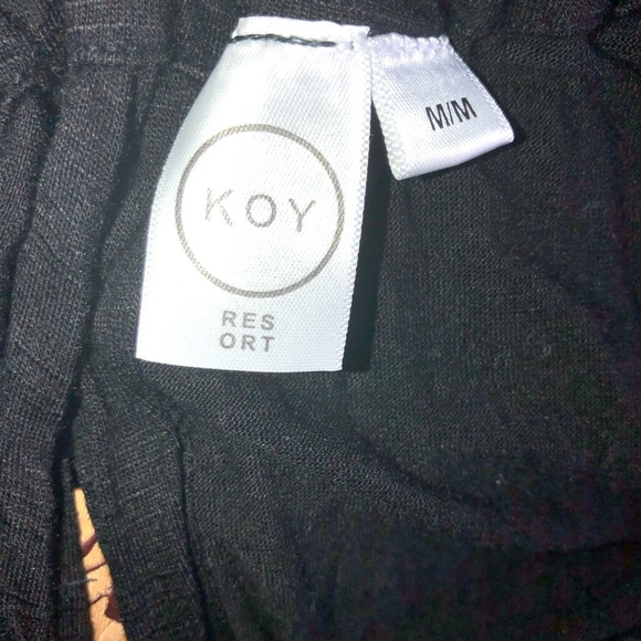 Elegant Black Halter Swim Dress - Picture 11 of 11